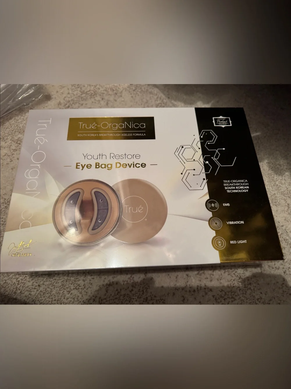 True-OrgaNica Youth Restore Eye Bag Device — Gold